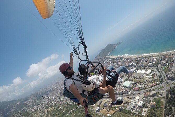 Alanya: Tandem Paragliding Experience - Group size, languages, and how long the whole day feels
