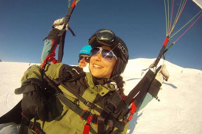 Davos Absolutely Free Flying Paragliding Tandem Flight 1'000 Meters High - In the air over the valleys: smooth glide, spins, and optional steering