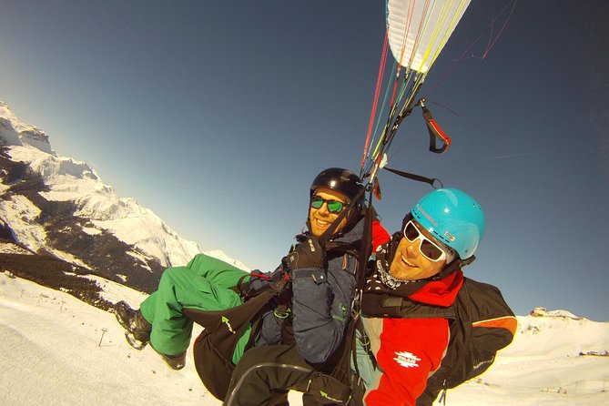 Davos Absolutely Free Flying Paragliding Tandem Flight 1'000 Meters High - Landing back in Davos: quick steps and a clean finish