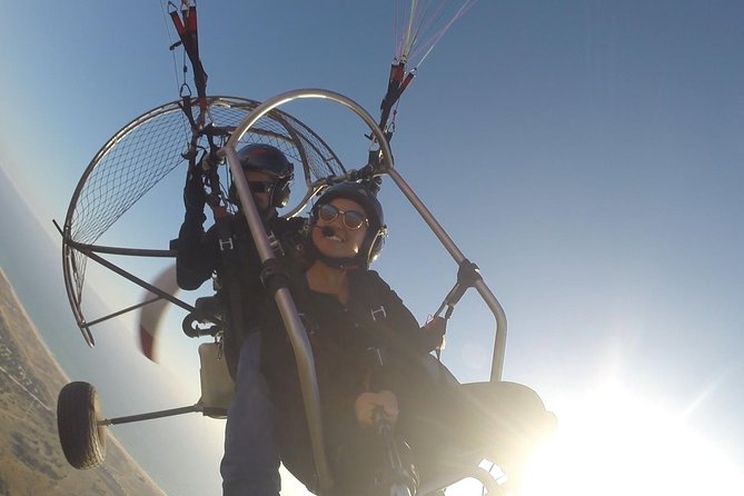 Flight experience over the beach in paragliding/paratrike in the Algarve with video. - Guide quality and safety focus with pilots like Valdemar