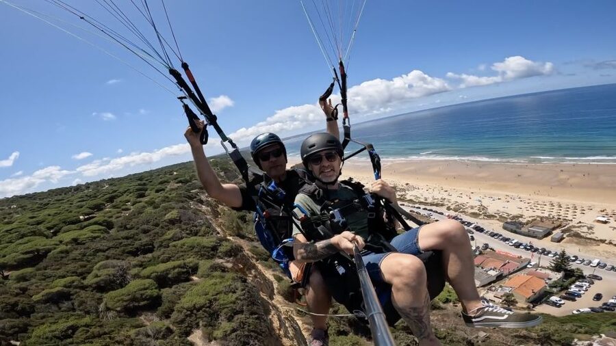 From Lisbon: Paragliding Tandem Flight - Launch day flow: inflatable canopy, safety checks, and a calm start