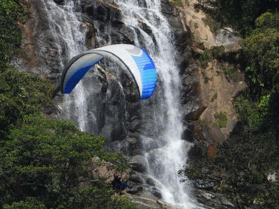 From Medellín: Paragliding Flight and Guatape Tour - Stone of Guatapé: the panoramic payoff, and the extra ticket cost