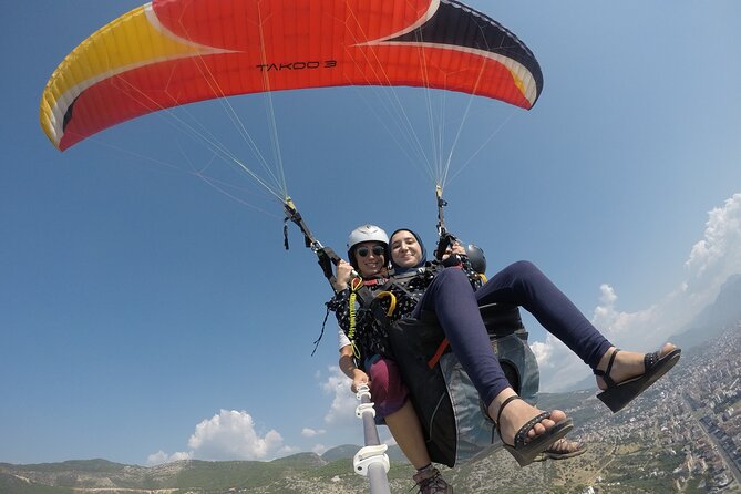 Halal Tandem Paragliding With Licensed Woman Pilot in Alanya - The views: turquoise-blue sea, Alanya Castle, and the coastline perspective