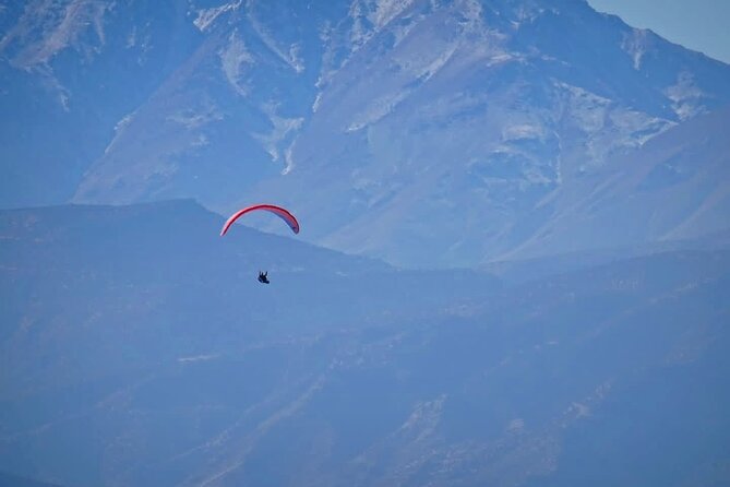 Half-Day Paragliding in Marrakech and Atlas Mountains - The flight itself: equipment included, pilot in charge, and about 15 minutes overhead