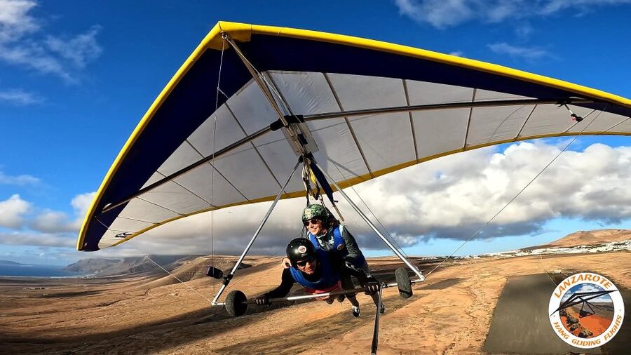 Lanzarote Hang Gliding Tandem Flights - In the air: volcanoes, lava malpais, and beaches from above