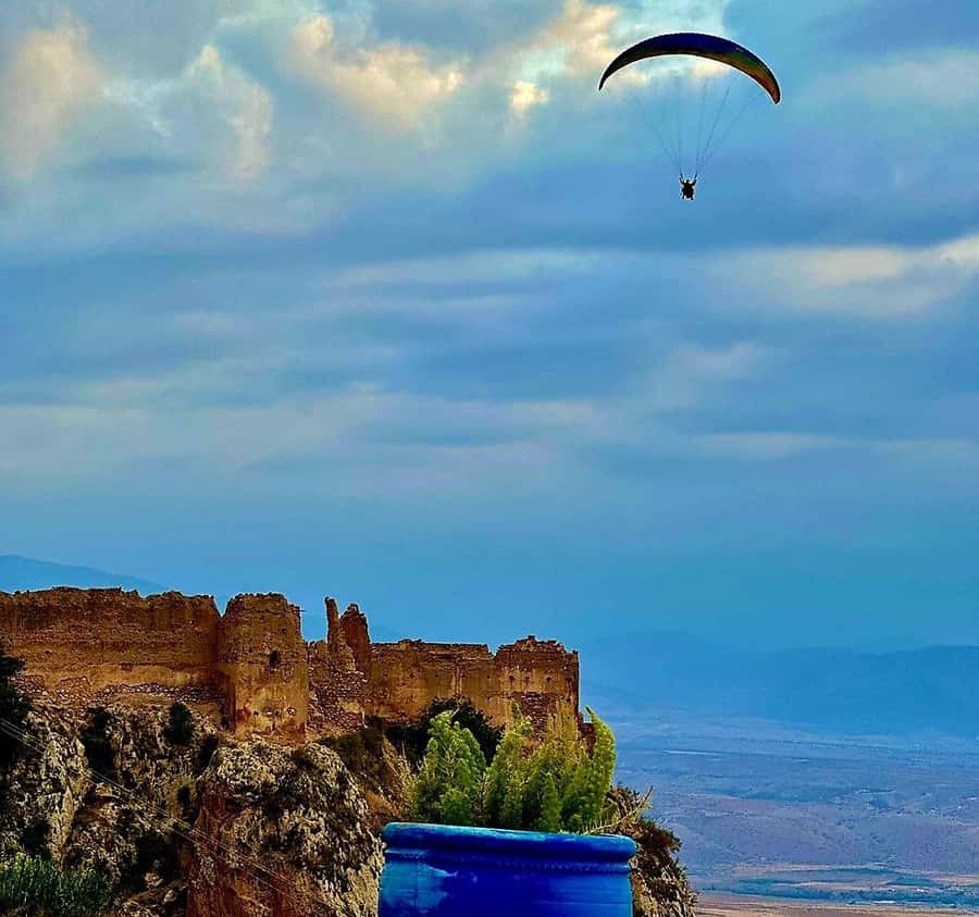 Marrakech: Paragliding over Agafay Desert & Atlas Mnt Views - The viewpoint waiting area: tea, breakfast, camel options, and safety talk