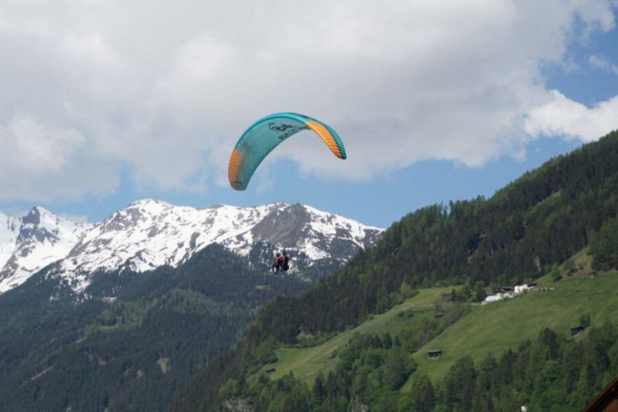 Neustift im Stubaital: Morning Paragliding Experience - Tandem briefing and gear check: how they set you up to relax