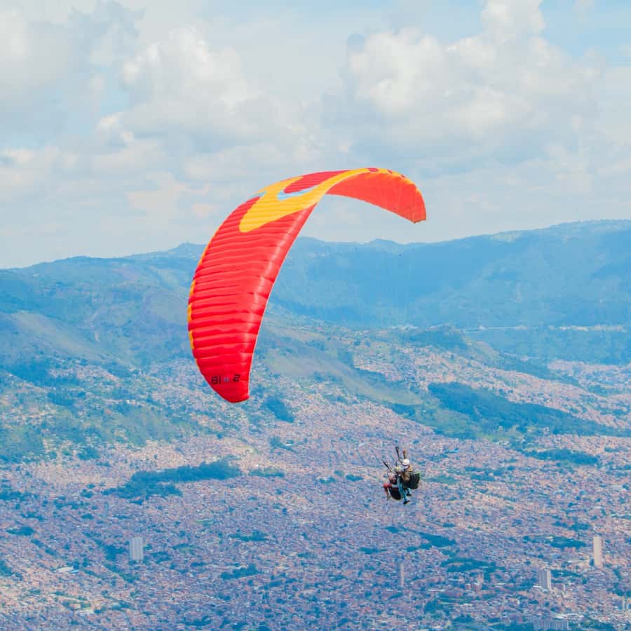 Paraglide over beautiful Medellin - Why This Medellín Combo Works Better Than Just Flying