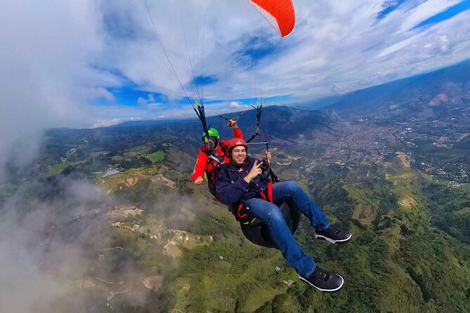 Paragliding flight in Medellin with expert pilots - Your Time Aloft: Clouds, Wind, Medellín Views, and Optional Maneuvers