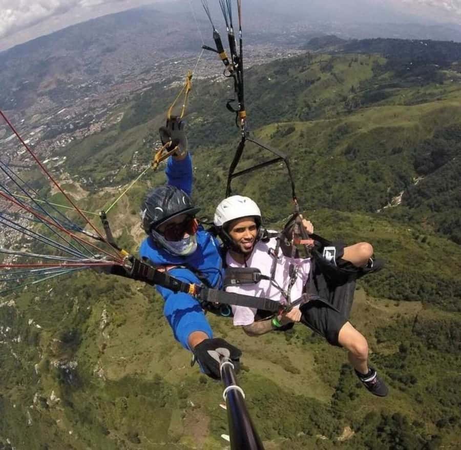 Paragliding Medellin with Transportation and free Videos - In-Air Tricks and 360 Views: How to Ask for More Without Overcomplicating It