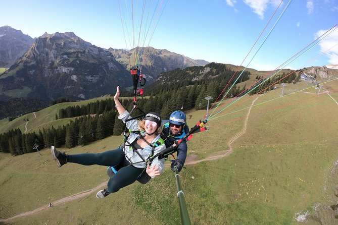 Paragliding Tandemflight Lucerne - Engelberg - The takeoff briefing and the moment your nerves decide to cooperate