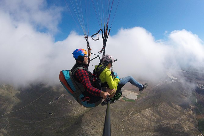 Premium Paragliding in Tenerife : Photos, videos and pickup included - The Lift-Off: That Quiet Step Into the Sky