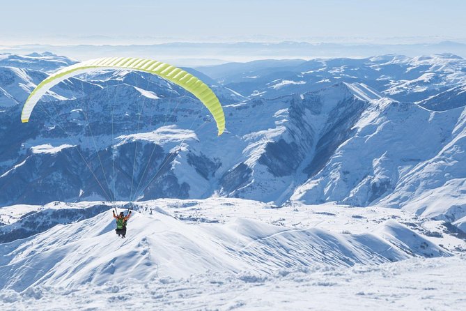 Private Full Day Tour In Kazbegi - Gudauri (Paragliding & Rafting) - Gergeti Trinity Church at 2170m: the day’s main viewpoint, with one weather variable