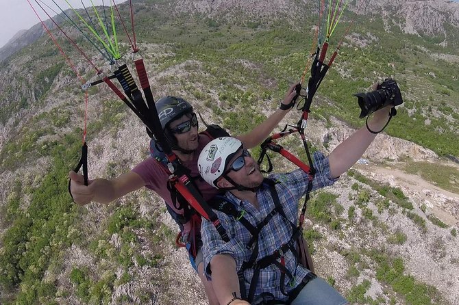 Tandem paragliding in Budva /All-inclusive - GoPro footage: download link included, SD pickup optional