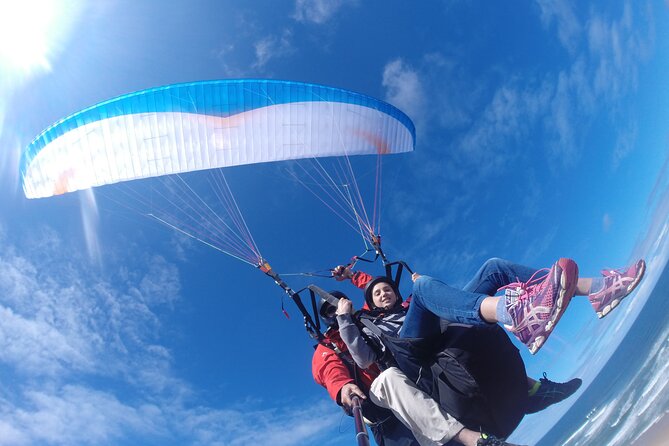 Tandem Paragliding Instructional Flights in Garden Route - How Tandem Paragliding Works: Harness, Wing Inflation, and a Short Run Off Into the Air